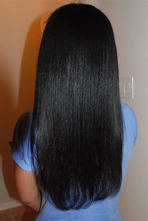 After applying a heat protecting cream, use a curling iron to create loose waves in your hair. Healthy Relaxed Hair Feature: How does she get such ...