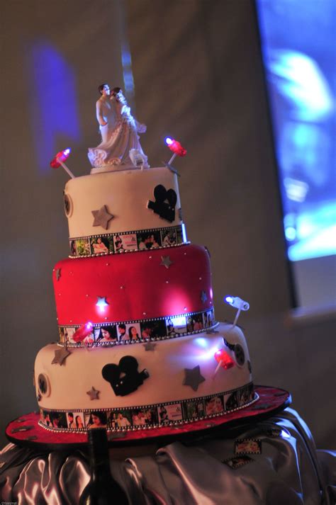 Hollywood Theme Cake With Led Lights And The Couples Photos In The Film