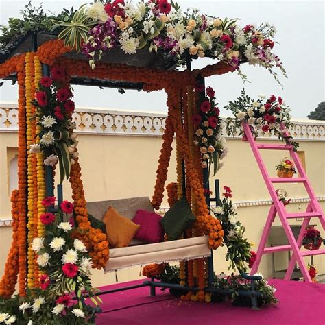 15 Vibrant Jhoola Swing Decor Ideas To Beautify Your Mehndi Ceremony