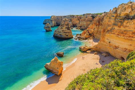 Mit einer küstenlinie von mehr als 200 km und mit mehr als 320 tagen sonnenschein pro jahr ist die algarve portugals reiseziel nummer 1 in europas geworden. Visit Algarve, Portugal - Vintage Travel