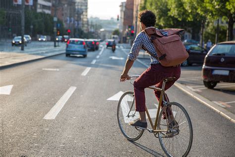 Young Stylish Man Riding A Bike To Work By Jovo Jovanovic Commute