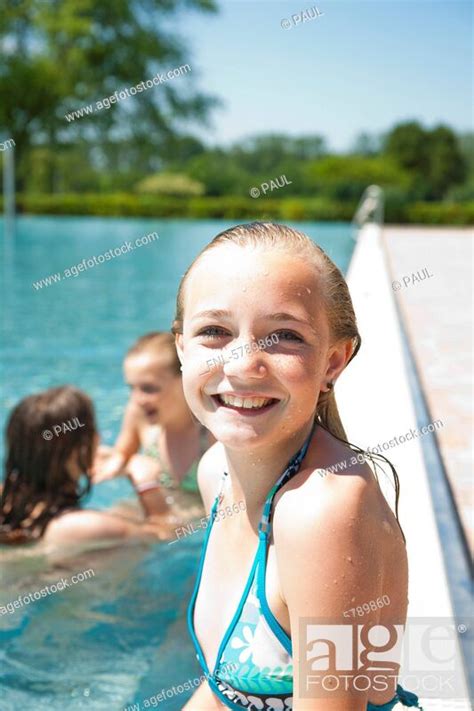 Smiling Girl In Swimming Pool Stock Photo Picture And Rights Managed