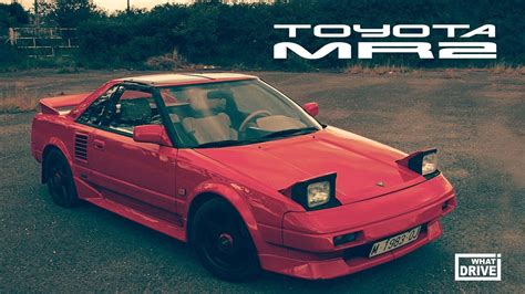 Download Sleek And Sporty Red Toyota Mr2 On The Open Road Wallpaper
