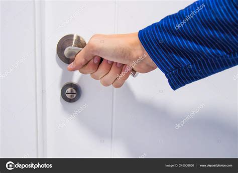 Hand Closing A Door