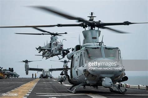 An Uh 1y Venom Utility Helicopter And An Ah 1z Viper Attack News