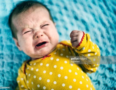 Portrait Of Crying Baby Girl High Res Stock Photo Getty Images
