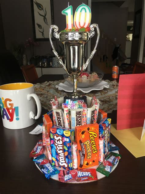 Birthday Cake Made Out Of Chocolate And Candy Bars With A Bonus Trophy