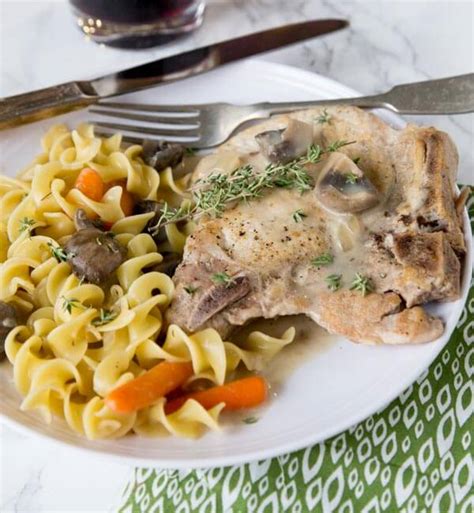 5) add the remaining 1/2 tablespoon of olive oil to the pan followed by the onions, and saute 6) decrease the heat to low and continue cooking for another 4 1/2 hours or until the pork is tender and falling away from the bone. Slow Cooker Pork Chops - Dinners, Dishes, and Desserts