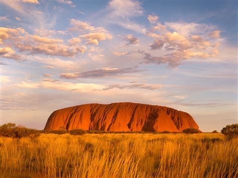 At 348 metres high, uluru is one of the world's largest monoliths, towering over the surrounding landscape and some 550 million years old. Visitors Will Soon Be Banned from Climbing Australia's ...