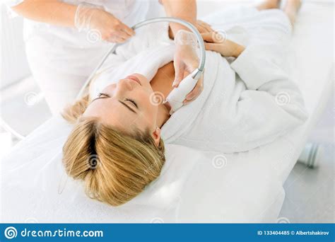 Woman Having A Stimulating Facial Treatment From A Therapist Stock Image Image Of Doctor Hand