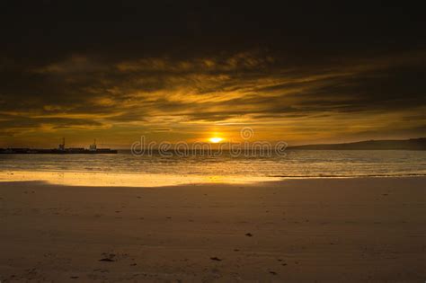An Orange Sunset On A Beach In The Orkney Isles Stock Image Image Of