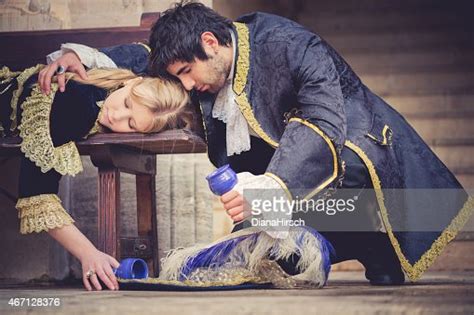 Desperate Romeo With Juliet Drinking The Poison High Res Stock Photo