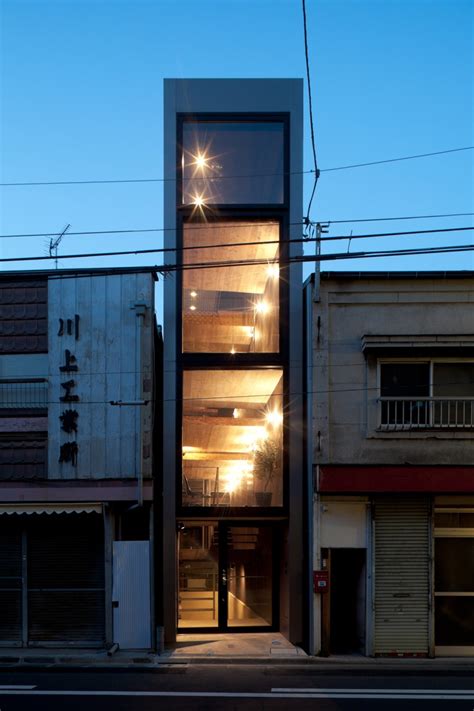 Long And Narrow House Squeezed Between Two Buildings