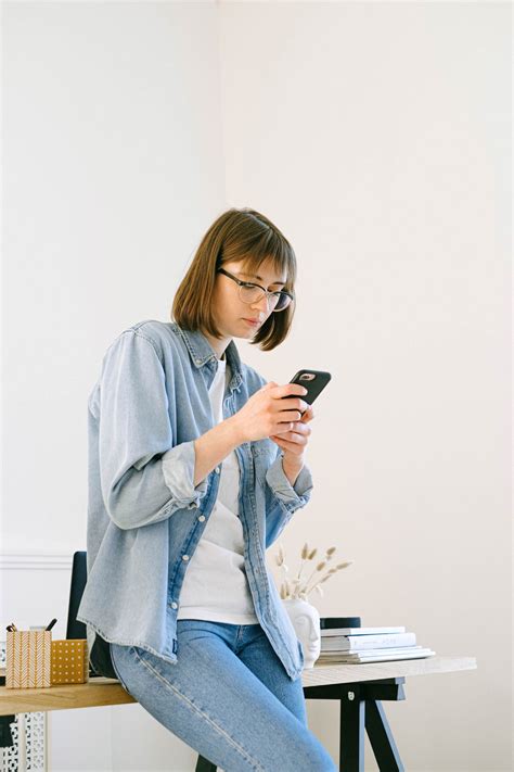 Woman Checking Smartphone · Free Stock Photo
