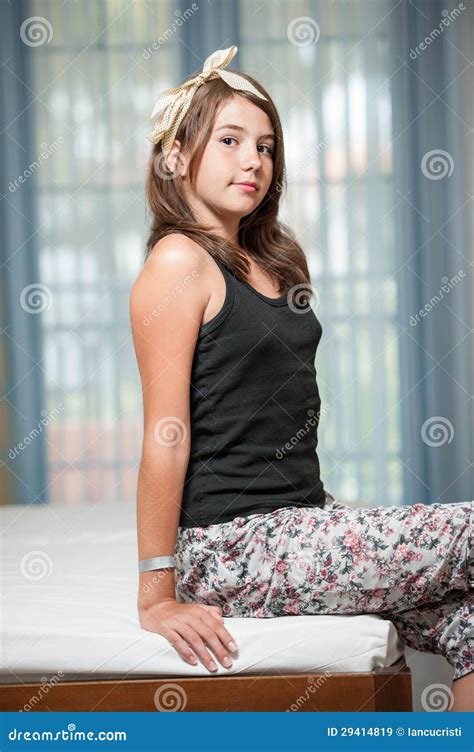 Image Of Pretty Teenager Posing Indoor In A Good Mood Royalty Free