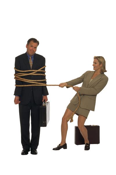 Businessman With Briefcase Tied Up By Businesswoman Free Photo Download