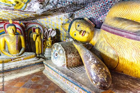 Giant Buddha Statues Inside Of The Buddhist Cave Temples In Dambulla