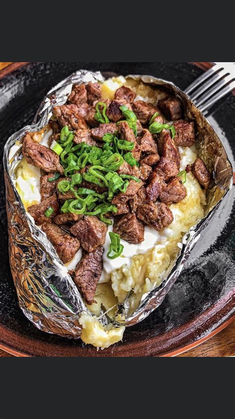 Bake for about 1 1/2 hours, or until the beef is very tender. I ate steak and cheese baked potato : food