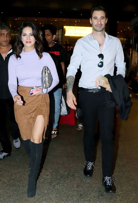 Photo Gallery Sunny Leone And Husband Daniel Weber Nail Airport