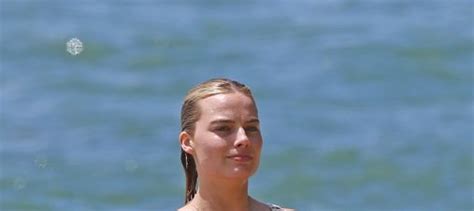 Margot Robbie Sunbathes Topless On The Beach On Loved Up Holiday The