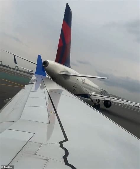 Moment United Plane Collides With A Delta Aircraft On The Tarmac At