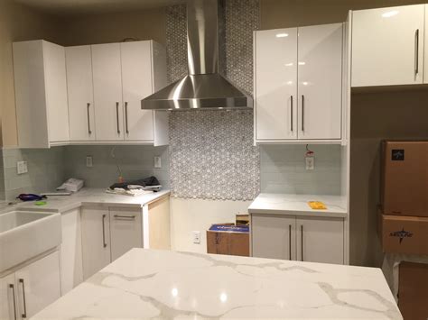 The sleek glossy surface of these cabinets makes them easy to clean and effortless to pair with any design. How to Design the Dream Kitchen: White Gloss Euro Cabinets