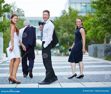 Business People Turning Around While Walking Stock Image Image Of