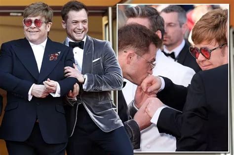 Taron Egerton Kisses Elton John S Hand And Ties His Laces At Rocketman Premiere Mirror Online