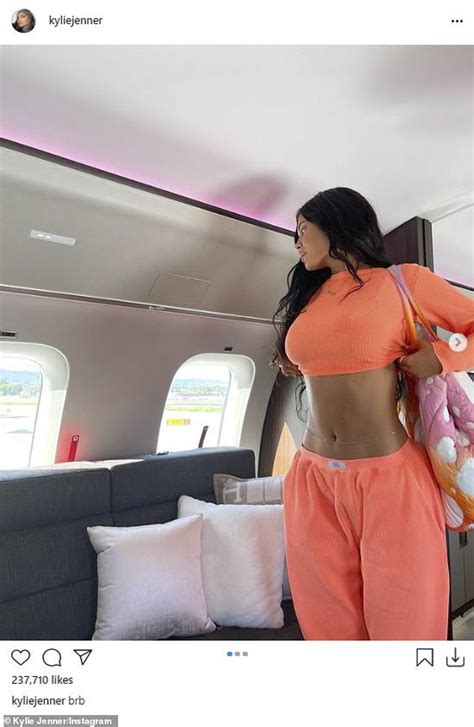 Kylie Jenner Shows Off Very Taut Tummy In Orange Crop Top And Matching