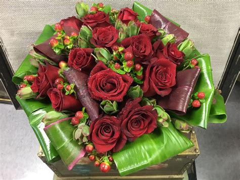 They'd hung up but he still had the phone in his hand when a blue flash came out. Roses Are Red... | Floral studio, Red roses, Heaven sent