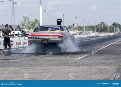 Chevrolet Drag Car Making Smoke Show On The Race Track At The Starting
