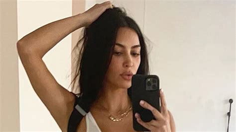 Kim Kardashian Goes Braless And Nearly Busts Out Of Bodysuit In New