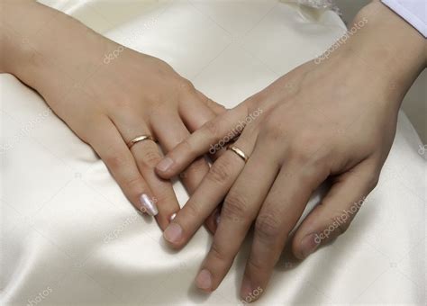 Hands Of A Newly Married Couple — Stock Photo © Danetic 2290798