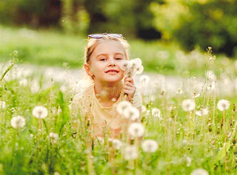 Little Girl Outside On Dandelion Field Stock Photo Image Of Childhood