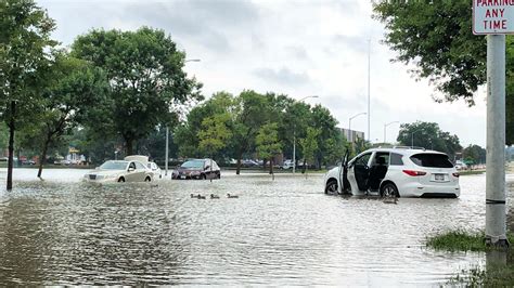 Widespread flooding is reported in Madison after as much as 13 inches