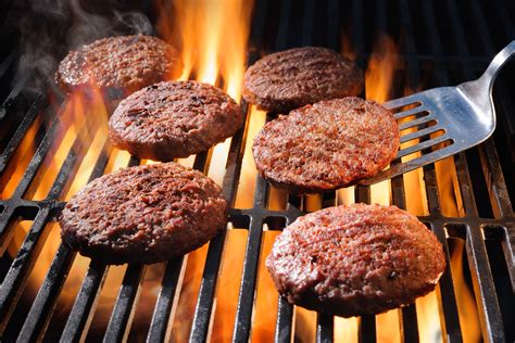 Beef Hamburger Patties Sizzling On The Barbecue Askdrmanny