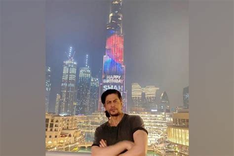To my brother, the awesomely cool mr. On 55th birthday SRK poses at illuminated Burj Khalifa