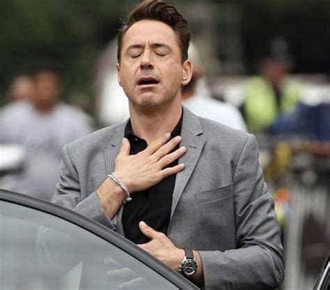 Robert Downey Jr Relieved Reaction Relieved Happy Relaxing Hand Touching Chest Robert