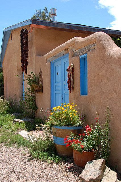 The exotic essence of the outer facades is equally matched by vibrant color combinations on the inside, with an unabashed exhibition. Adobe house | Adobe house exterior, Modern adobe house ...