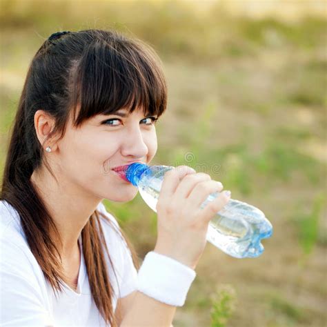 Runner Woman Drinking Water After Jogging Stock Photo Image Of Drink