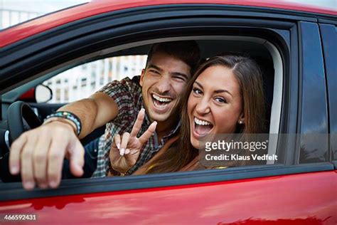 Couple Red Car Photos And Premium High Res Pictures Getty Images