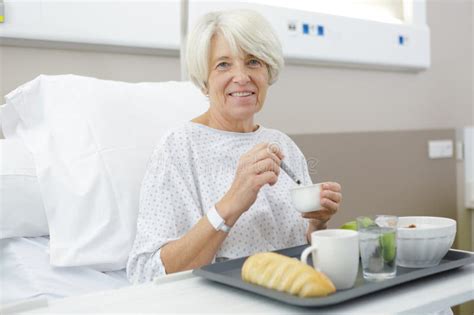 Senior Hospital Patient Eating Lunch On Tray Stock Photo Image Of