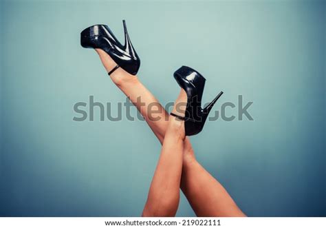 Sexy Female Legs Wearing High Heels