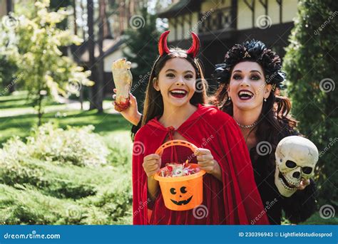 Excited Mom And Daughter In Devil Stock Image Image Of Cheerful