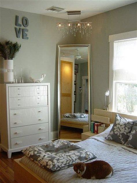 Start by putting your bed in the center of the most visible wall. Silver Floor Mirror - Transitional - bedroom