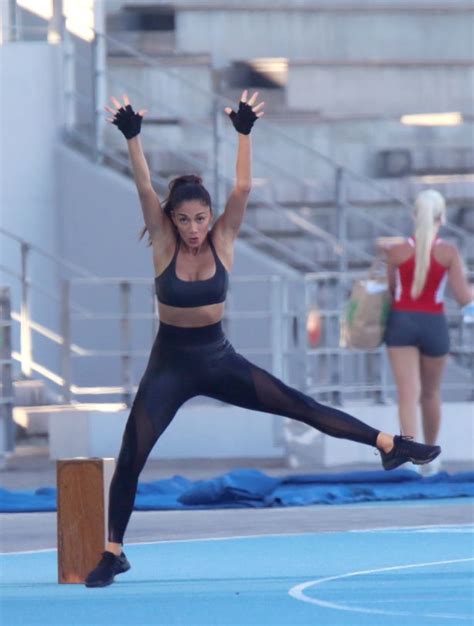 Nicole Scherzinger Shows Off Her Figure In Tight Lycra As She Works Up