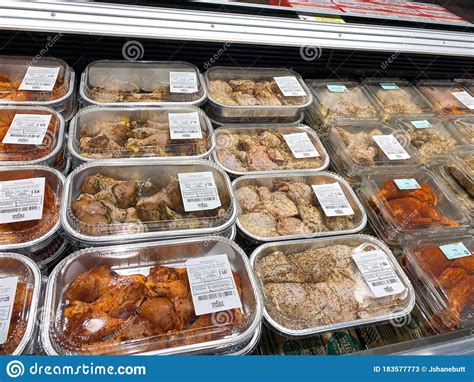 A Display Of Ready To Bake Chicken Dinners At A Whole Foods Market