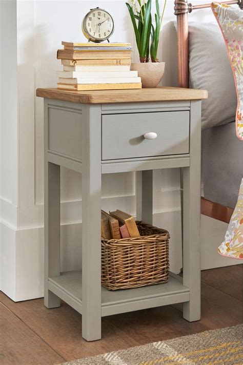 From mirrored to oak designs, brands like ikea and dunelm have the nightstands you need to keep your alarm clock, lamp and books handy. Next Hampton Slim 1 Drawer Bedside Table - Grey | Painted ...