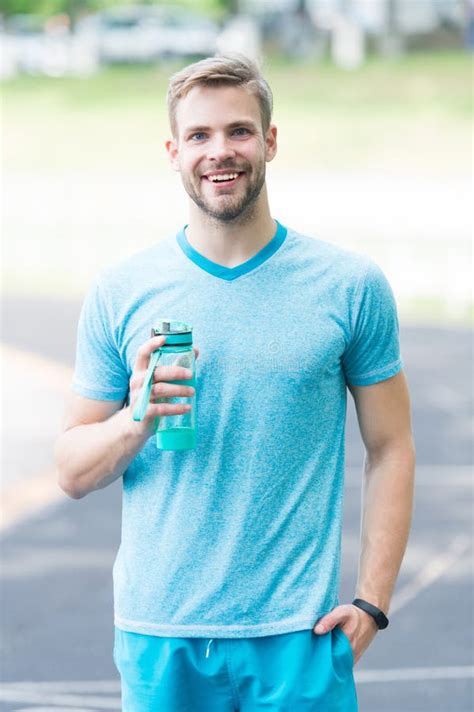 Drink Some Water Man With Athletic Appearance Holds Water Bottle Man