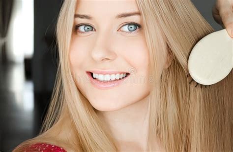 Beautiful Happy Woman Combing Her Long Blond Hair Stock Photo Image